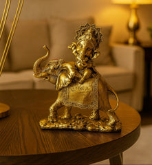 Golden Baby Ganesha on Elephant Figurine