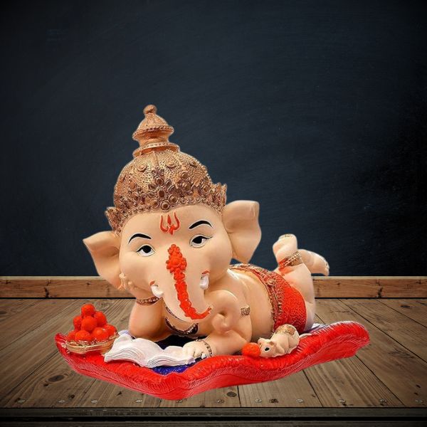 "Polyresin Lord Ganesha Reading Book & Enjoying Ladoo Showpiece":